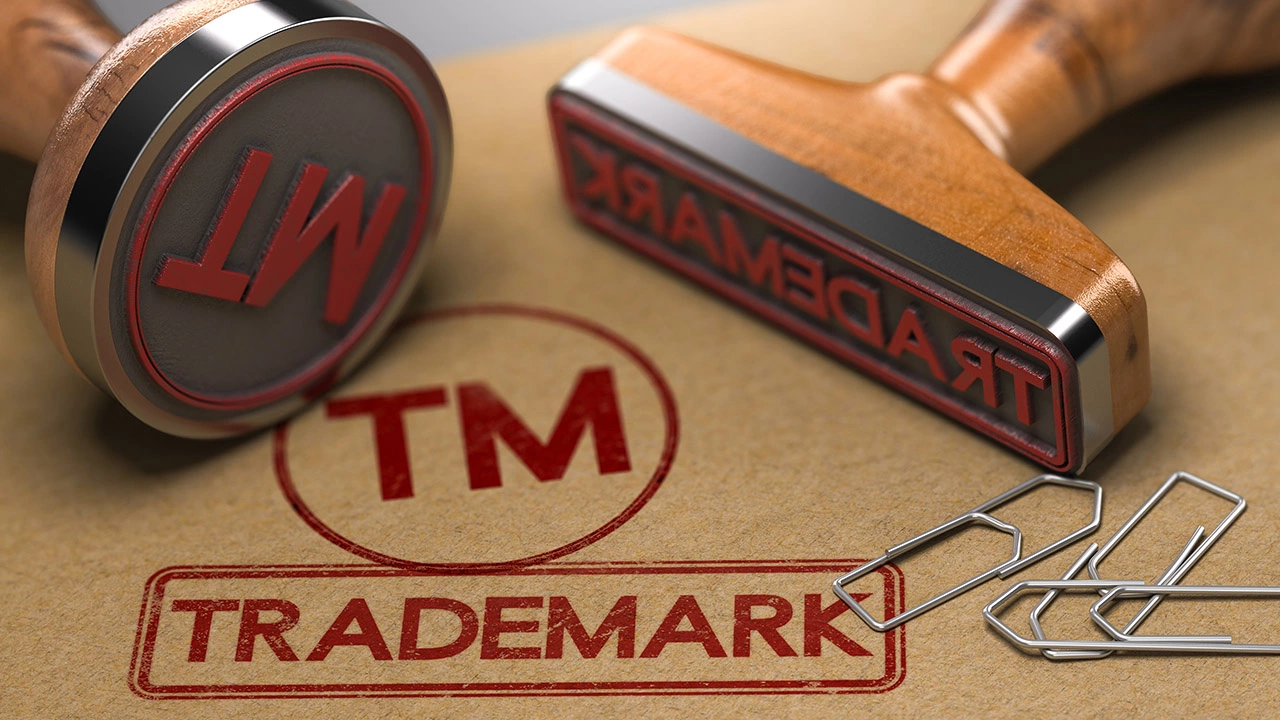 Is it illegal use ® or ™ on some name that isn't trademarked?